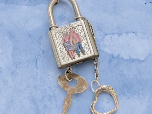 Small vintage padlock with key, sterling silver heart, & tiny couple