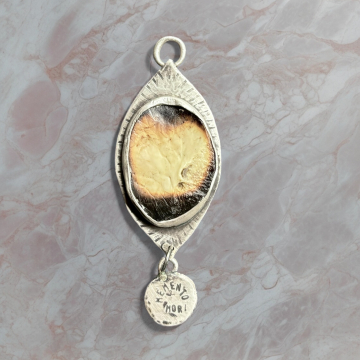 Memento Mori with burned human skull section