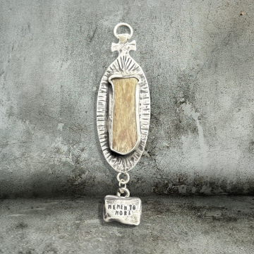 Memento Mori with human rib section